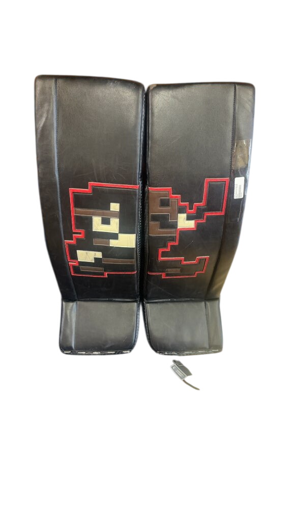 Brian's Hockey Goalie Pad Set Custom 8-Bit Mario Used Senior

In good shape. Seam needs to be sewn in the blocker but it’s all ready to go out on the ice in the beauty custom Brian’s pads - image 1