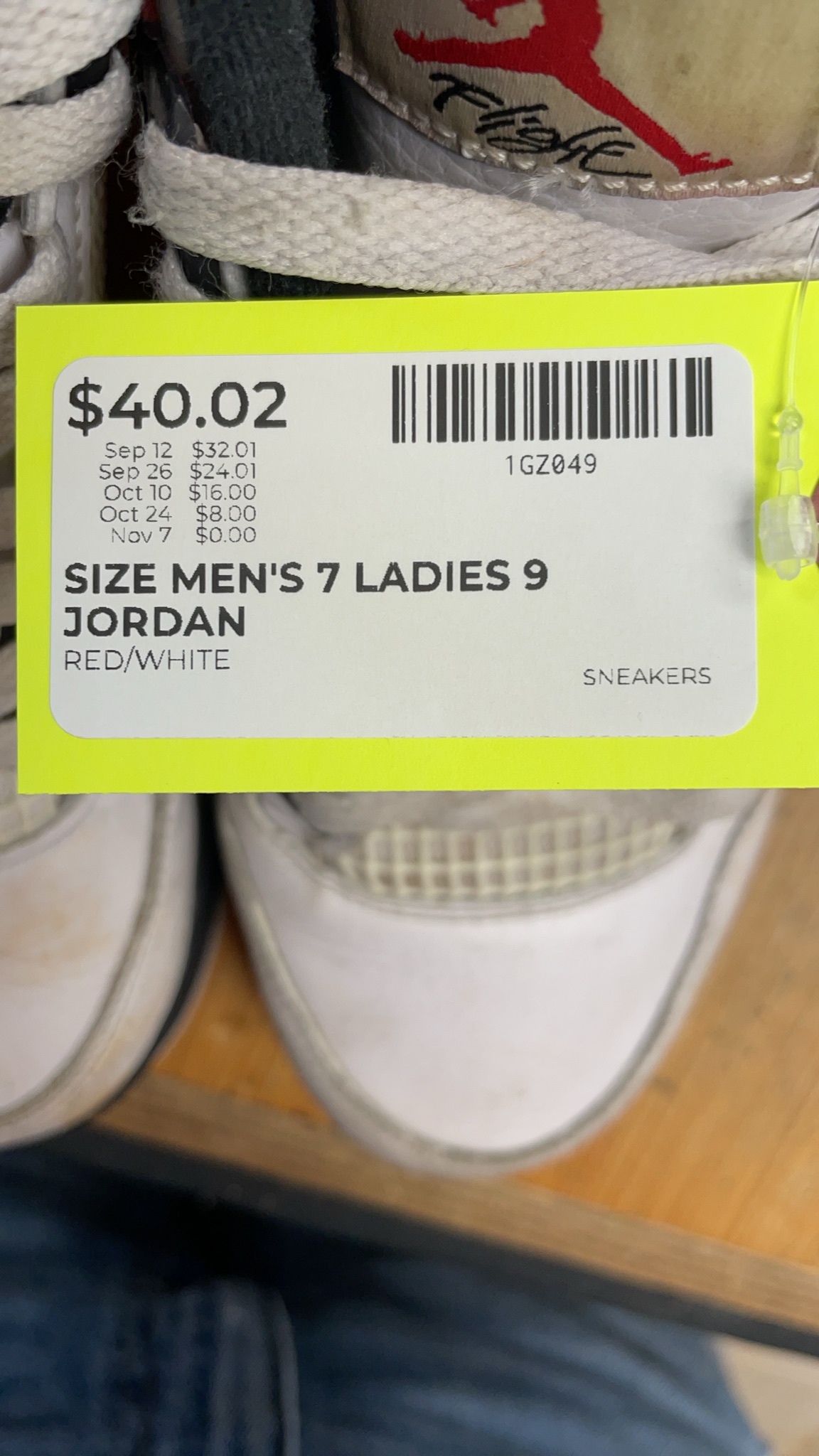 Jordan 4 Men's 7 Ladies 9 Red/White Sneakers