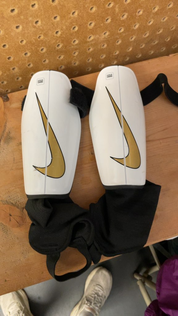 Nike Charge Shin Guards with Bag