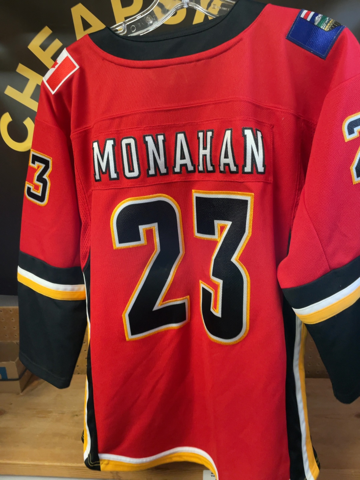 NHL Calgary Flames Monahan #23 Hockey Jersey Size L/XL Youth